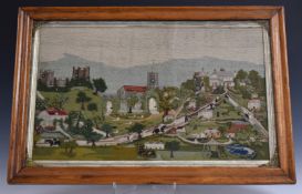 Early Victorian crewel work depicting figures and mounted riders on lanes in a village with