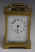 A c1900 brass French carriage clock, the enamel Arabic dial marked 'Exam'd by Mappin & Webb London',