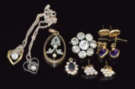 A collection of 9ct gold earrings including one pair set with a heart cut amethyst to each, two