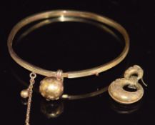 Victorian bangle with a sphere charm and a Victorian earring, 7.4g