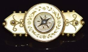 Victorian yellow metal brooch set with a seed pearl, verso a glass compartment, 3.3 x 1.6cm, 3.4g