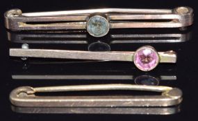 Three 9ct gold brooches, two set with topaz, 6.1g in vintage box
