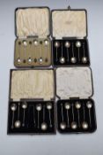 Four cased sets of hallmarked silver coffee bean spoons, one with tongs, weight 161g all in