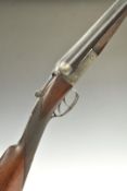 Two 12 bore side by side shotguns, each with engraved locks, trigger guard, underside and thumb