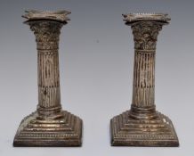 Pair of Victorian hallmarked silver Corinthian column candlesticks, London 1890, maker William