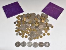 A quantity of modern crowns, two in Royal Mint packs and a 1902 Coronation example, together with