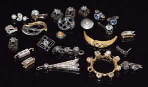 A collection of jewellery parts set with diamonds