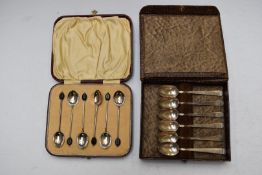 Two cased sets of hallmarked silver spoons, one coffee bean spoons, the other Art Deco style