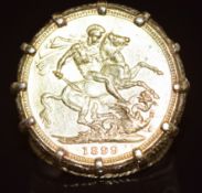 An 1899 full gold sovereign with Sydney mint mark, in 9ct gold mount, 15.9g, size M/N