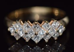 An 14ct gold ring set with 16 princess cut diamonds, total diamond weight approximately 0.96cts, 3.