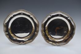 Garrard pair of hallmarked silver plates, with shaped and gadrooned edges, London 1902, also