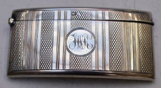 Edward VII hallmarked silver curved calling card case with engine turned decoration, Birmingham