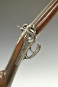 Rossi Italian double barrelled over and under percussion hammer action gun with engraved locks,