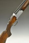 Lincoln 12 bore over and under ejector shotgun with rose engraved locks, line engraved locks,