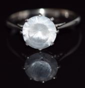 An 18ct white gold ring set with a round cut white sapphire, 3.7g, size Q