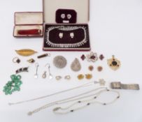 A collection of vintage brooches, pearl necklace, filigree brooch, diamanté, silver bracelet,