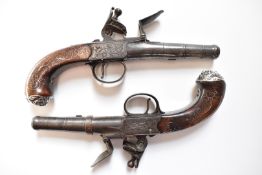 A pair of Adams of London Queen Anne flintlock pocket pistols with named and engraved locks,