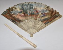 A 19thC carved ivory brise fan with hand decorated classical scene and foiled stones and a carved