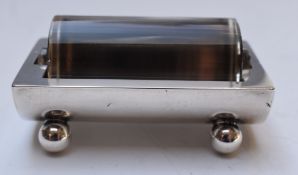 George V hallmarked silver and glass stamp roller or wetter, having glass roller, the barrel