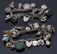 Two silver charm bracelets with over 29 charms including enamel clover, St Christopher, shell,