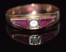 A 9ct gold ring set with a white sapphire and synthetic rubies, 1.4g, size O