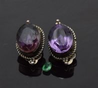 A pair of silver earrings set with foiled amethysts by Russell Sam and a loose 0.3ct oval cut