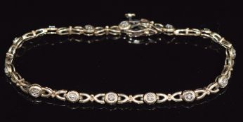 A 9ct gold bracelet set with diamonds, 7.1g