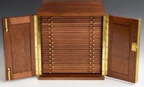 Peter Nichols mahogany coin collector's cabinet the twin doors opening to reveal 28 drawers with