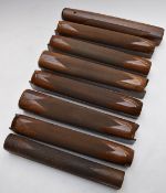 Eight semi-automatic Browning, Beretta, Miroku or similar chequered shotgun forends.