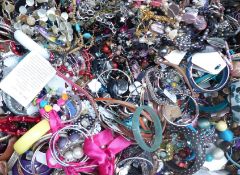 A collection of costume jewellery including necklaces, bangles, bracelets, etc