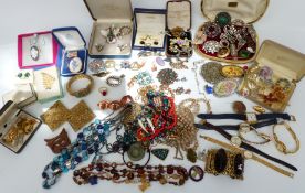 A collection of jewellery including beads, necklaces, brooches, cufflinks, Wedgwood brooch, etc