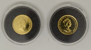 Two miniature gold coins, one commemorating Henry VIII, the other Lord Nelson