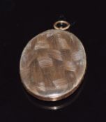 Georgian 9ct gold locket set with plaited hair, reading 