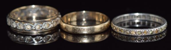 A 9ct gold wedding band (2.0g, size M), silver ring (1.4g, size P) and silver and 9ct gold ring, 2.