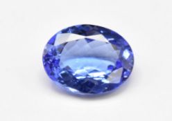 A loose 1.87ct oval cut natural tanzanite, with certificate