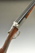 Army & Navy 20 bore side by side shotgun with line engraving to the named locks, trigger guard,