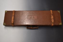 Stephen Grant & Joseph Lang leather bound shotgun case with fitted interior, brass lock and fittings