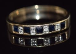A 9ct gold ring set with alternating sapphires and diamonds, 1.9g, size P