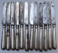 Set of twelve William IV or Victorian hallmarked silver handled knives with steel blades marked