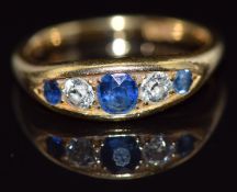 A c1920 18ct gold ring set with round cut diamonds and sapphires, 5.5g, size O