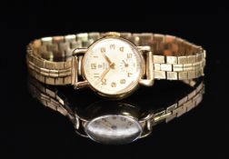 Tudor 9ct gold ladies wristwatch with subsidiary seconds dial, gold hands and Arabic numerals, cream