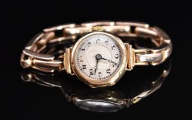 Edwardian 9ct gold ladies wristwatch with blued Breguet hands, Arabic numerals, silver dial and