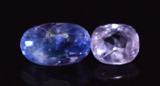 A loose oval cut purple sapphire measuring 2.56cts & a loose cushion cut purple sapphire measuring