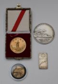 50 gram 800 grade silver bar marked ICI, together with three commemorative medallions, one for China