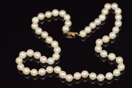 A single strand of cultured pearls with an 18ct gold clasp