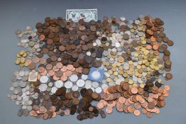An amateur coin collection of UK and overseas coins, some silver content including pre-1920 and