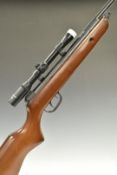 BSA Meteor .22 air rifle with semi-pistol grip and Tasco 4x20 scope, serial number WE0425C.