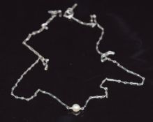 A 9ct white gold necklace set with a pearl, 2.1g