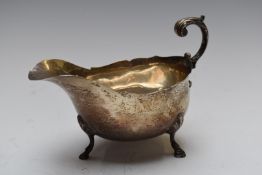 Edward VII hallmarked silver sauce boat raised on three feet, Chester 1904, maker George Nathan &