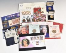 A collection of commemorative coin and stamp presentation packs, includes 1936 'Three Kings' example